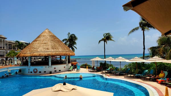 Swimming pool at a tropical beach resort